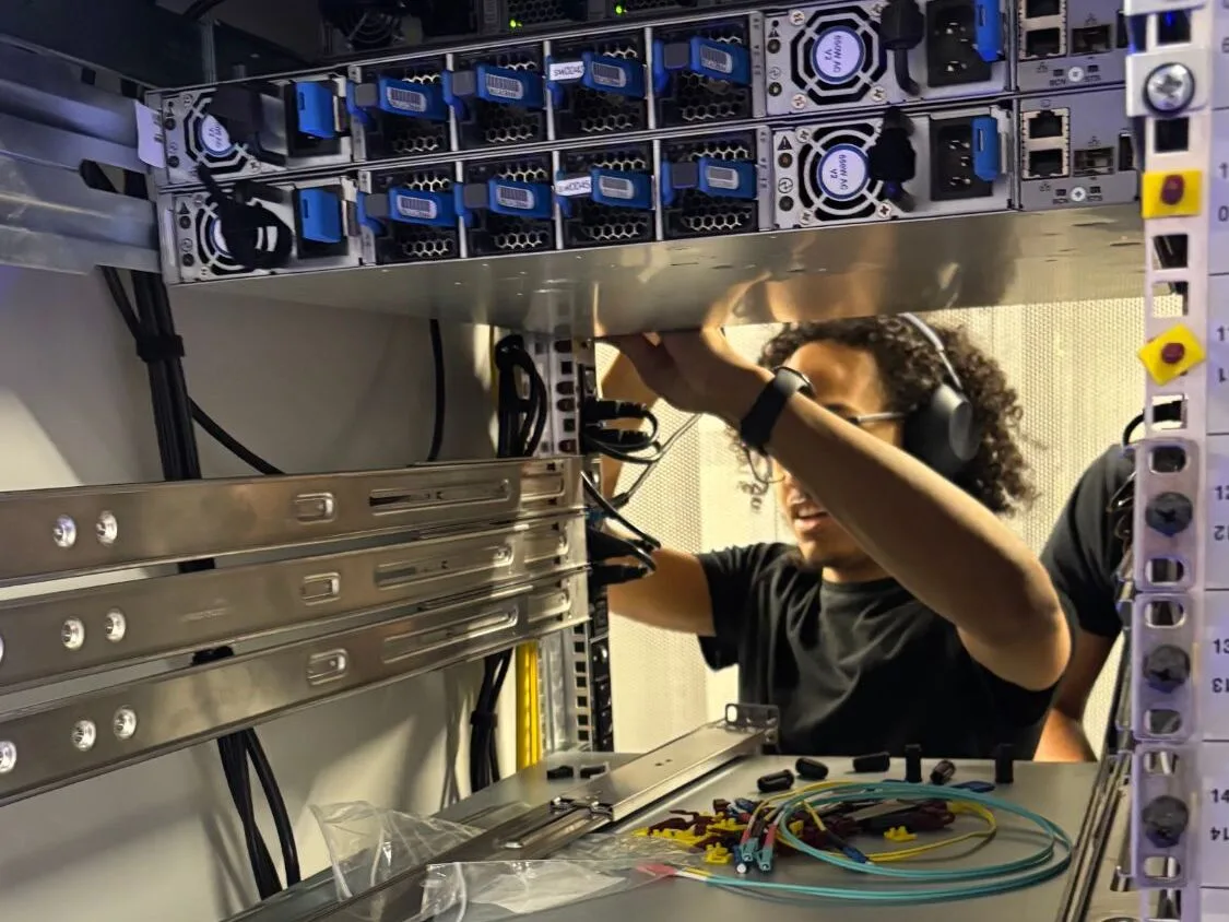 Our engineer installing a server in a rack